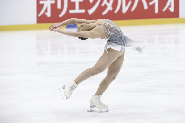 Kaori Sakamoto leads the women's short program at figure